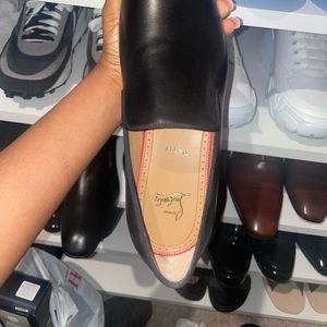 Christian loubintin black shoe.